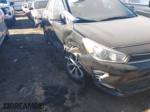 2022 Kia Rio S with VIN 3KPA25AD8NE443590, listed as a IAAI auction lot 41684325 with 73,231 mi miles and . Bid and sale history available at DreamBid. Image 17.
