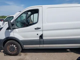 2016 Ford Transit Cargo with VIN 1FTYE1ZM0GKB06687, listed as a IAAI auction lot 42232871 with 330,423 mi miles and . Bid and sale history available at DreamBid. Image 14.