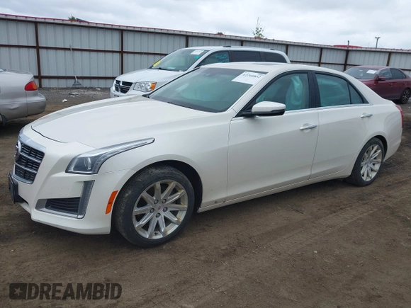 2014 Cadillac CTS Luxury AWD with VIN 1G6AX5S3XE0184524, listed as a IAAI auction lot 42260852 with 139,667 mi miles and . Bid and sale history available at DreamBid. Image 2.
