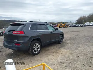 2014 Jeep Cherokee Latitude with VIN 1C4PJMCS5EW201459, listed as a IAAI auction lot 42092653 with 147,430 mi miles. Bid and sale history available at carsss.com. Image 4.