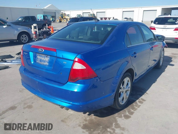 2012 Ford Fusion SE z VIN 3FAHP0HA9CR395009, wystawiony jako IAAI lot #41855650 z przebiegiem 178 901 mil mil oraz . Historia ofert i sprzedaży dostępna na DreamBid. Obrazek 4.