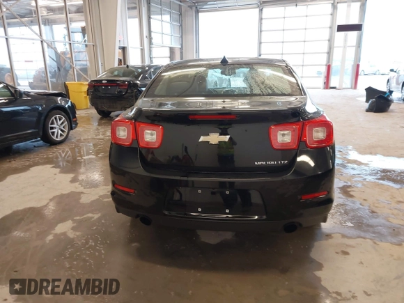 2013 Chevrolet Malibu LTZ with VIN 1G11H5SA1DU129095, listed as a IAAI auction lot 41556006 with 170,477 mi miles and . Bid and sale history available at DreamBid. Image 16.