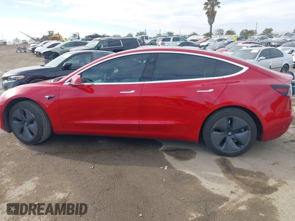 2020 Tesla Model 3 Standard Range Plus with VIN 5YJ3E1EA9LF718027, listed as a IAAI auction lot 41679320 with 68,987 mi miles. Bid and sale history available at carsss.com. Image 14.