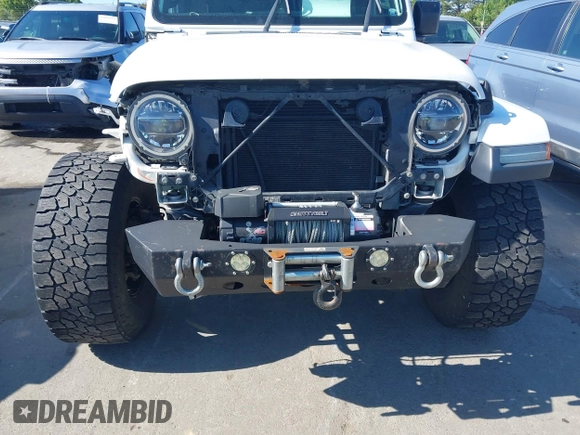 2018 Jeep Wrangler Unlimited Sahara z VIN 1C4HJXEG4JW106111, wystawiony jako IAAI lot #41994833 z przebiegiem 99 583 mil mil oraz . Historia ofert i sprzedaży dostępna na DreamBid. Obrazek 6.
