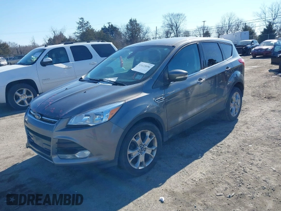 2013 Ford Escape SEL with VIN 1FMCU9H93DUA72572, listed as a IAAI auction lot 41633096 with 190,816 mi miles. Bid and sale history available at carsss.com. Image 2.
