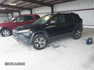 2014 Jeep Cherokee Trailhawk with VIN 1C4PJMBS3EW150366, listed as a IAAI auction lot 41971035 with 90,994 mi miles. Bid and sale history available at carsss.com. Image 16.