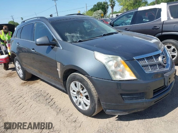 2012 Cadillac SRX with VIN 3GYFNGE32CS546815, listed as a IAAI auction lot 42014765 with 142,373 mi miles. Bid and sale history available at carsss.com. Image 1.