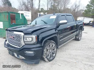 2017 GMC Sierra 1500 Denali with VIN 3GTU2PEJ5HG130000, listed as a IAAI auction lot 41232801 with 104,875 mi miles. Bid and sale history available at carsss.com. Image 17.