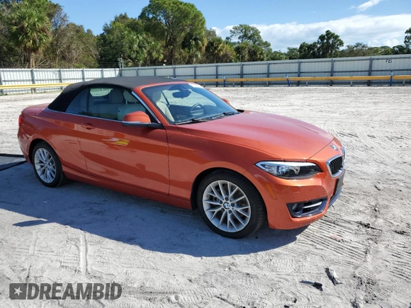 2016 BMW 2 Series 228i with VIN WBA1K9C50GV710942, listed as a Copart auction lot 77700934 with 28,643 mi miles and Salvage Title. Bid and sale history available at carsss.com. Image 4.