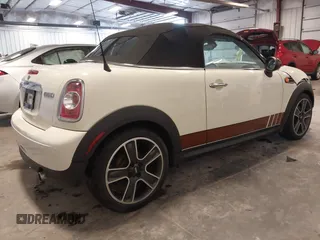 2013 MINI Roadster with VIN WMWSY1C52DT625564, listed as a IAAI auction lot 41442864 with 98,240 mi miles and . Bid and sale history available at DreamBid. Image 4.