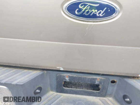2004 Ford F-150 XL with VIN 1FTPX12584NA58780, listed as a IAAI auction lot 42123687 with 160,672 mi miles. Bid and sale history available at carsss.com. Image 15.
