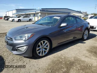2014 Hyundai Genesis Coupe 2.0T z VIN KMHHT6KD4EU119078, wystawiony jako Copart lot #86022114 z przebiegiem 144 039 mil mil oraz Szkoda całkowita • Salvage title. Historia ofert i sprzedaży dostępna na DreamBid. Obrazek 1.