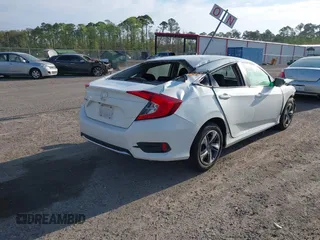 2020 Honda Civic LX with VIN 19XFC2F62LE212421, listed as a IAAI auction lot 41909995 with 46,312 mi miles and . Bid and sale history available at DreamBid. Image 4.