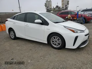 2021 Toyota Prius L Eco with VIN JTDKAMFU9M3146148, listed as a Copart auction lot 60747745 with 145,146 mi miles and Salvage title. Bid and sale history available at DreamBid. Image 4.