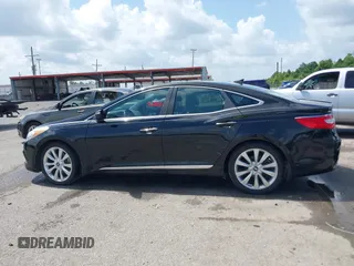 2013 Hyundai Azera z VIN KMHFH4JG0DA310957, wystawiony jako IAAI lot #42451780 z przebiegiem 82 827 mil mil oraz . Historia ofert i sprzedaży dostępna na DreamBid. Obrazek 14.