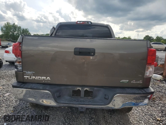 2013 Toyota Tundra с VIN 5TFDW5F11DX295149, выставлен на аукционе Copart как лот 58705855 с пробегом 285 533 миль миль и Списание • Salvage title. История ставок и продаж доступна на DreamBid. Изображение 6.
