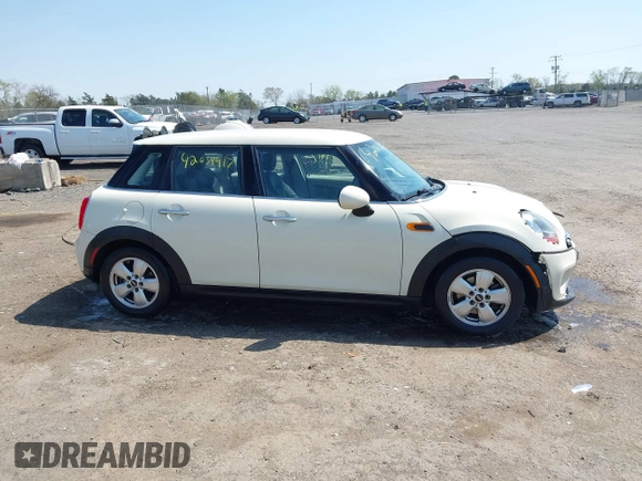2015 MINI Hardtop 4 Door with VIN WMWXS5C53FT832742, listed as a IAAI auction lot 42059417 with 114,671 mi miles and . Bid and sale history available at DreamBid. Image 13.