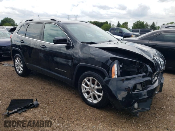 2014 Jeep Cherokee Latitude with VIN 1C4PJLCSXEW320764, listed as a Copart auction lot 83899244 with 140,904 mi miles and Salvage Title. Bid and sale history available at carsss.com. Image 4.