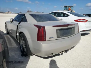 2006 Cadillac XLR z VIN 1G6YV36AX65603381, wystawiony jako Copart lot #77526894 z przebiegiem Nie podano mil oraz Nie do naprawy. Historia ofert i sprzedaży dostępna na DreamBid. Obrazek 2.