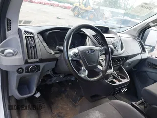2016 Ford Transit Cargo z VIN 1FTYR1YM0GKB55605, wystawiony jako IAAI lot #42211489 z przebiegiem Nie podano mil oraz . Historia ofert i sprzedaży dostępna na DreamBid. Obrazek 18.