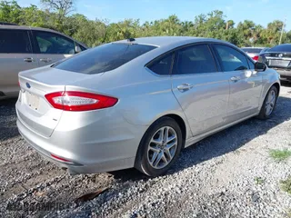2016 Ford Fusion SE with VIN 3FA6P0H71GR332343, listed as a IAAI auction lot 41964442 with 111,218 mi miles. Bid and sale history available at carsss.com. Image 4.