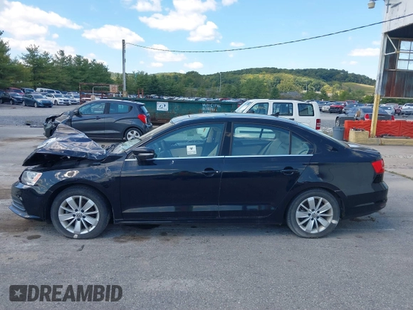 2015 Volkswagen Jetta Sedan 1.8T SE w/Connectivity with VIN 3VWD07AJ2FM255186, listed as a IAAI auction lot 35986577 with 7,853 mi miles. Bid and sale history available at carsss.com. Image 14.