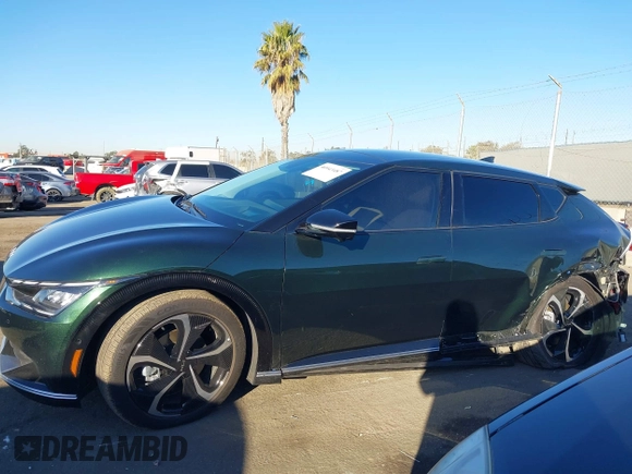 2023 Kia EV6 Wind with VIN KNDC3DLC6P5153657, listed as a IAAI auction lot 40943487 with 10,655 mi miles and . Bid and sale history available at DreamBid. Image 15.