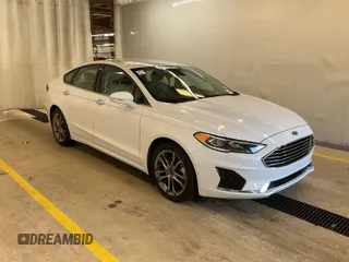 2020 Ford Fusion SEL z VIN 3FA6P0CD4LR177021, wystawiony jako IAAI lot #42743422 z przebiegiem 81 131 mil mil oraz . Historia ofert i sprzedaży dostępna na DreamBid. Obrazek 5.