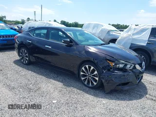 2016 Nissan Maxima SL with VIN 1N4AA6AP3GC383303, listed as a IAAI auction lot 42324235 with 125,736 mi miles and . Bid and sale history available at DreamBid. Image 1.