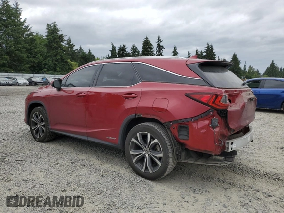 2018 Lexus RX 450hL Premium with VIN JTJDGKCA5J2002701, listed as a Copart auction lot 60258935 with 73,437 mi miles and Salvage title. Bid and sale history available at DreamBid. Image 2.