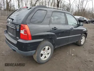 2009 Kia Sportage LX with VIN KNDJE723097622429, listed as a Copart auction lot 52960575 with 167,492 mi miles and Salvage Title. Bid and sale history available at carsss.com. Image 3.