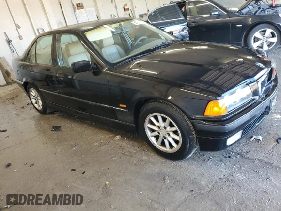 1997 BMW 3 Series 328iA with VIN WBACD432XVAV46101, listed as a Copart auction lot 88912345 with 149,163 mi miles and Salvage Title. Bid and sale history available at carsss.com. Image 4.