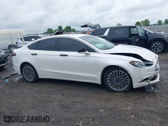 2017 Ford Fusion SE with VIN 3FA6P0H92HR178972, listed as a IAAI auction lot 42243949 with 157,544 mi miles and . Bid and sale history available at DreamBid. Image 13.