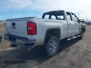 2016 GMC Sierra 2500HD SLE z VIN 1GT22SEG5GZ232894, wystawiony jako IAAI lot #41593141 z przebiegiem 159 000 mil mil oraz . Historia ofert i sprzedaży dostępna na DreamBid. Obrazek 4.