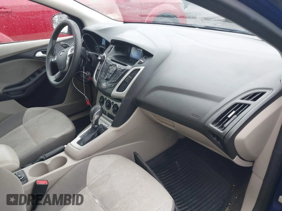 2012 Ford Focus SE with VIN 1FAHP3F23CL345654, listed as a IAAI auction lot 42231539 with 77,360 mi miles and . Bid and sale history available at DreamBid. Image 5.