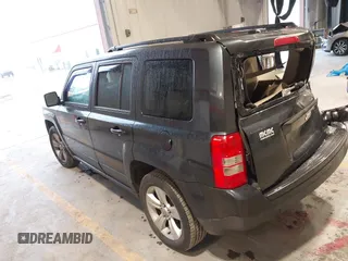 2014 Jeep Patriot Latitude with VIN 1C4NJPFA0ED633657, listed as a IAAI auction lot 41447982 with 104,664 mi miles and . Bid and sale history available at carsss.com. Image 3.