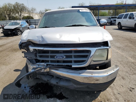 2001 Ford F-150 XL with VIN 1FTRX07L71KA57207, listed as a Copart auction lot 64843825 with Not provided miles and Salvage title. Bid and sale history available at DreamBid. Image 5.