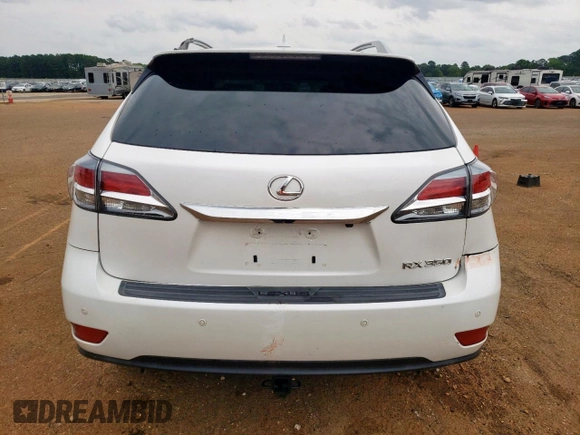 2013 Lexus RX 350 z VIN 2T2BK1BA7DC180812, wystawiony jako Copart lot #57476565 z przebiegiem 130 727 mil mil oraz Szkoda całkowita • Salvage title. Historia ofert i sprzedaży dostępna na DreamBid. Obrazek 6.