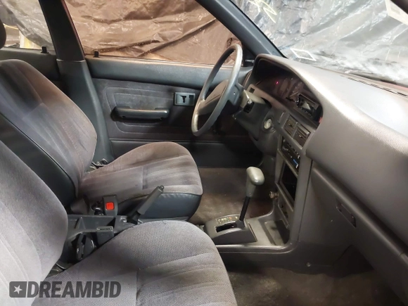 1991 Toyota Corolla with VIN 2T1AE94A4MC063109, listed as a IAAI auction lot 41357536 with 81,958 mi miles and . Bid and sale history available at DreamBid. Image 5.