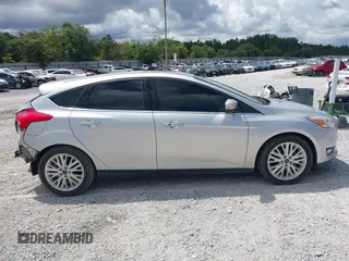 2018 Ford Focus Titanium with VIN 1FADP3N29JL232336, listed as a IAAI auction lot 42485243 with 82,113 mi miles and . Bid and sale history available at DreamBid. Image 13.