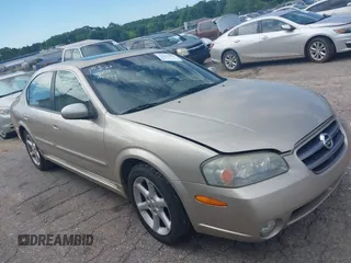 2003 Nissan Maxima SE z VIN JN1DA31D33T510169, wystawiony jako IAAI lot #42339254 z przebiegiem 182 862 mil mil oraz . Historia ofert i sprzedaży dostępna na DreamBid. Obrazek 1.