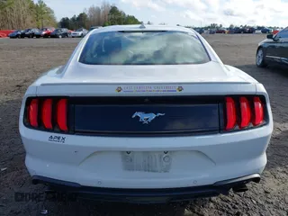 2021 Ford Mustang EcoBoost with VIN 1FA6P8TH6M5105467, listed as a IAAI auction lot 41732934 with 69,287 mi miles. Bid and sale history available at carsss.com. Image 16.
