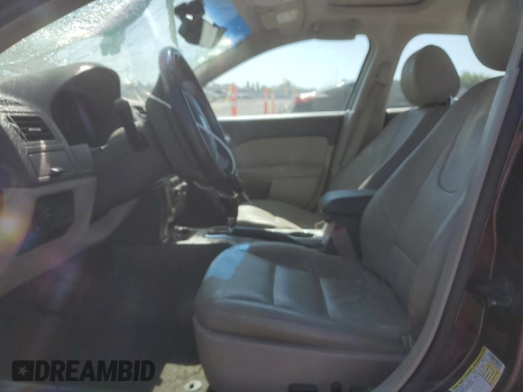 2012 Ford Fusion SEL z VIN 3FAHP0JA5CR365855, wystawiony jako Copart lot #58206175 z przebiegiem 72 223 mil mil oraz Szkoda całkowita • Salvage title. Historia ofert i sprzedaży dostępna na DreamBid. Obrazek 7.