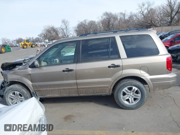 2005 Honda Pilot EX-L z VIN 2HKYF18665H523484, wystawiony jako IAAI lot #41697429 z przebiegiem 294 241 mil mil oraz . Historia ofert i sprzedaży dostępna na DreamBid. Obrazek 14.