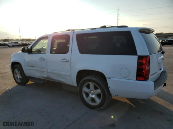2009 Chevrolet Suburban LT w/2LT with VIN 1GNFC26J09R147755, listed as a Copart auction lot 72418304 with 239,660 mi miles and Salvage Title. Bid and sale history available at carsss.com. Image 2.