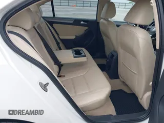 2014 Volkswagen Jetta TDI w/Premium with VIN 3VWLL7AJXEM372547, listed as a IAAI auction lot 42320105 with 113,200 mi miles and . Bid and sale history available at DreamBid. Image 8.