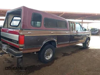 1990 Ford F-250 with VIN 1FTHX25G3LKB31027, listed as a IAAI auction lot 41985838 with 86,502 mi miles and . Bid and sale history available at DreamBid. Image 4.