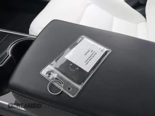 2018 Tesla Model 3 Long Range Battery z VIN 5YJ3E1EB8JF096249, wystawiony jako IAAI lot #42150031 z przebiegiem 70 981 mil mil oraz . Historia ofert i sprzedaży dostępna na DreamBid. Obrazek 11.
