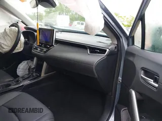 2023 Toyota Corolla Cross XLE с VIN 7MUDAAAG4PV062515, выставлен на аукционе IAAI как лот 42323389 с пробегом 30 092 миль миль и . История ставок и продаж доступна на DreamBid. Изображение 5.