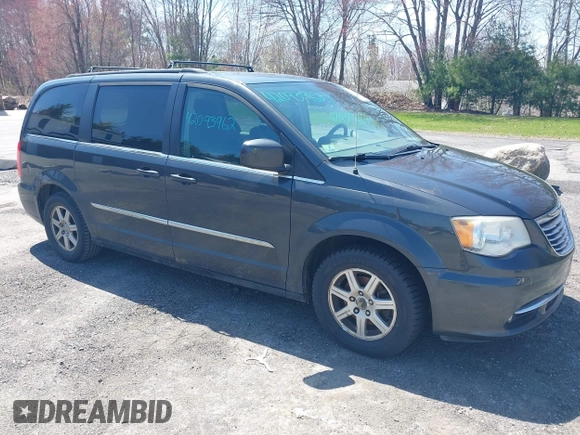 2012 Chrysler Town & Country Touring with VIN 2C4RC1BG4CR189809, listed as a IAAI auction lot 42093962 with 180,324 mi miles. Bid and sale history available at carsss.com. Image 1.